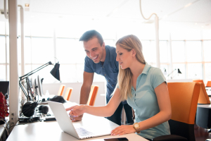 Employees working at a computer