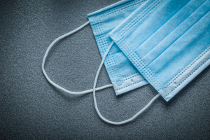 Surgical masks on a gray background