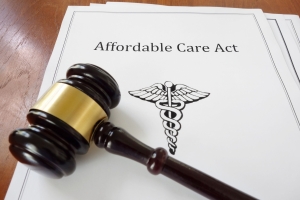 Document titled Affordable Care Act with a judge's gavel resting on top
