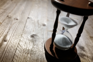 Hourglass on a wooden table